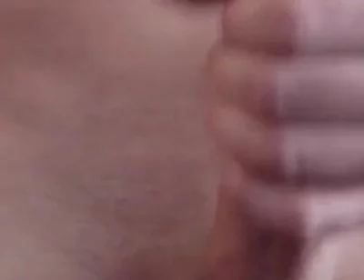 Masturbating