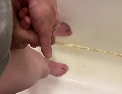 Amateur Boy Pissing, with Close-up and Good Quality Slow Motion of the Load of Pee Coming Out of the Pee-hole (urethra)