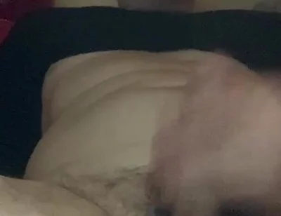 Masturbating