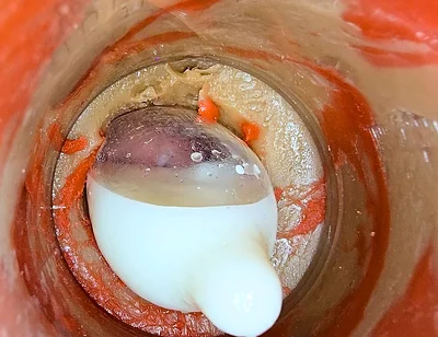 The Camera 4K Inside the Deep Pussy Records a Huge Ejaculation with a Stuck Condom