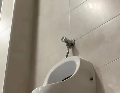 Amateur Twink Boy and Older Guy Caught Having Risky Fun in the Pool's Public Toilets