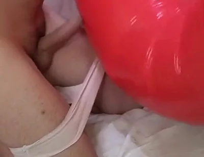 Playing with Red Swimring Pool Toy