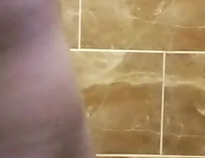Some Scenes of Cutting Hair in the Toilet with the Door Closed