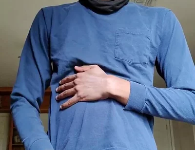 Masturbating