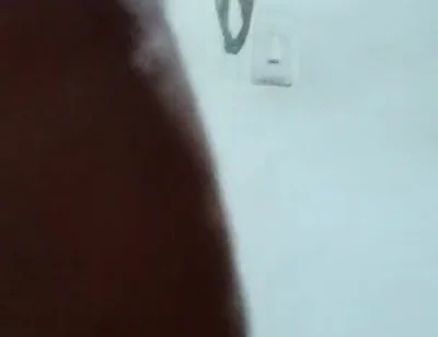 Spilling milk while my neighbor stares out the window