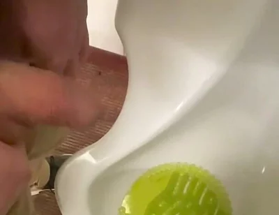 Amateur Redhead Guy Caught Pissing in a Public Toilet's Urinal - He Then Quickly Plays with His Cock Before Leaving
