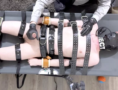 Rubber Twink Strapped Down and Made to Eat His Own Cum