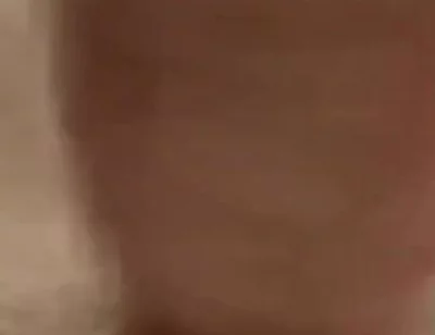 Masturbating