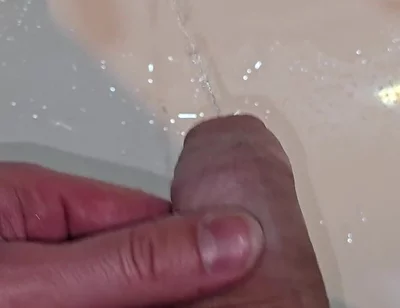 Pissing to the Bathroom Sink