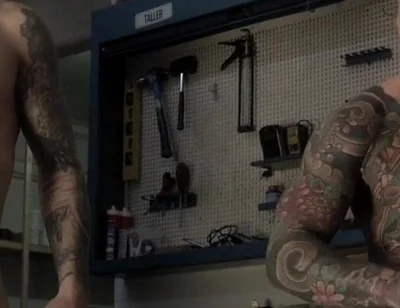 Two Friends in the Mechanic's Workshop