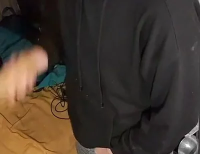 I Masturbate in Sweatpants, a Black Sweatshirt and Nike Sneakers