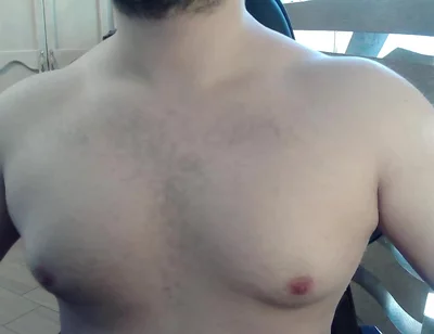 Muscular Stud Plays with His Nipples and Muscles