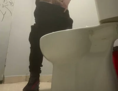 Amateur Friends Pissing Together in the Club's Toilets