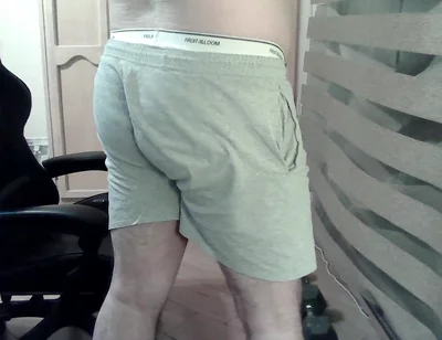 Muscular Camboy Flexes His Muscles and Squats