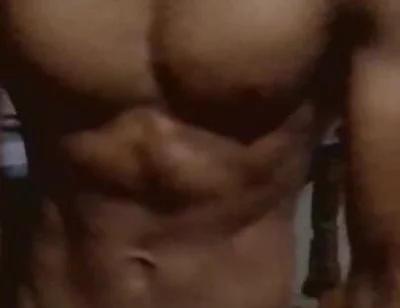 Showing His Abs and Core Area