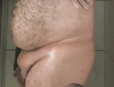 Fat Bear Taking a Shower