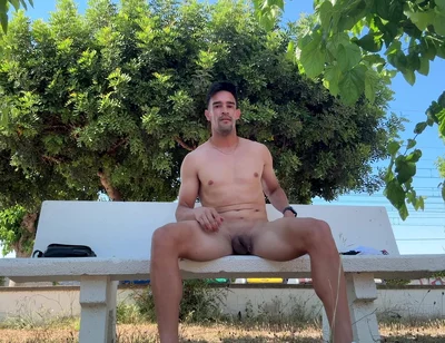 Hot Stud Fully Naked on Public Park Bench Gets Caught