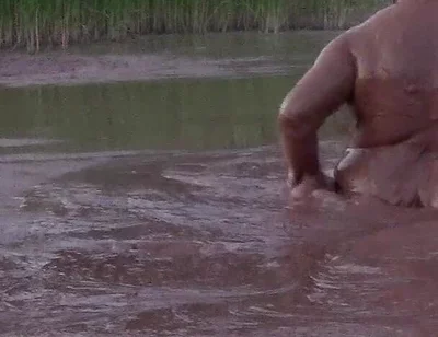 Mud Bath in Deep Quarry Mud Pond