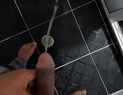 Urinating in Dark Jeans