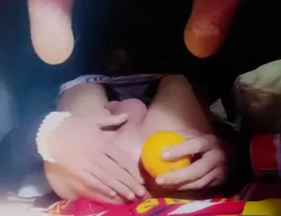 A Young Man Stuffs a Crystal Ball and an Orange up His Tight Ass.