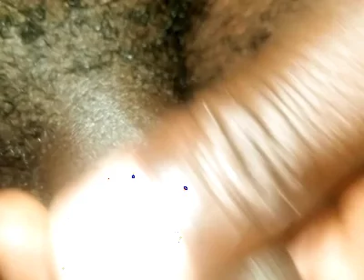 Masturbating