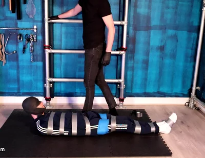 Bound and Struggling in Tape Bondage (4k)
