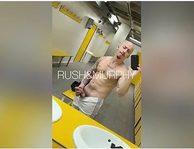 He Masturbates His Huge Cock In The Gym Showers While Muscular Straight Man Spies On Him
