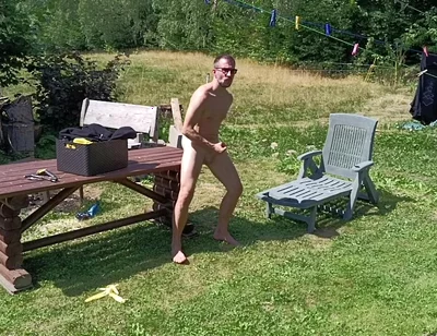 Jerking off While Hanging Out the Laundry