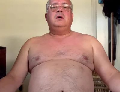 Old Man Nude in Bedroom