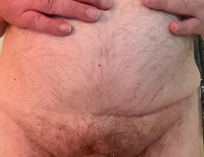 Coach Karl Rubs His Belly 6811
