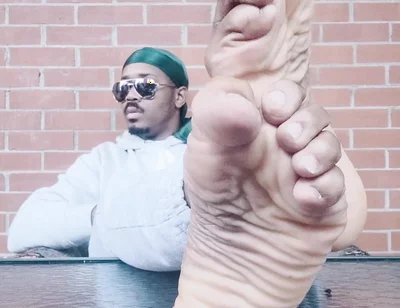 I Expose My Feet and I Touch Them