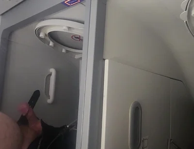 Airplane Bathroom Jerk and Cum.