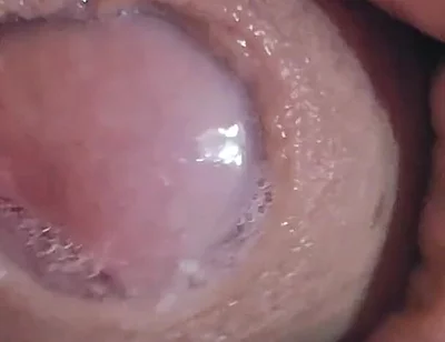 Close-up of Glans Ejaculating Intensely Before Cumming.