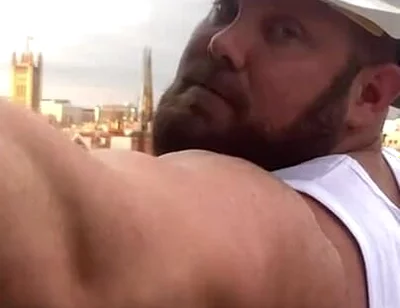 Builder Iron Bending Muscle Flexing and Measuring