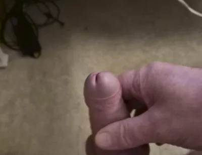 My Friend Sits in a Chair and Jerks off His Cock While Watching Video