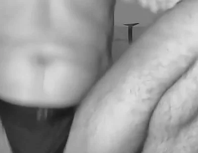 Man with Shaved Body Having Fun with His Toys