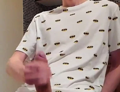 Sweet load of cum flows from this cute guy's big cock