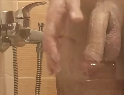 A Young Guy Washes in the Shower and Dreams of Someone Being Next to Him
