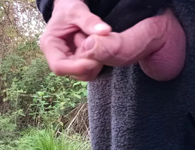 Moaning Squirting Cumshot Wanking in the Woods Wearing Onesie